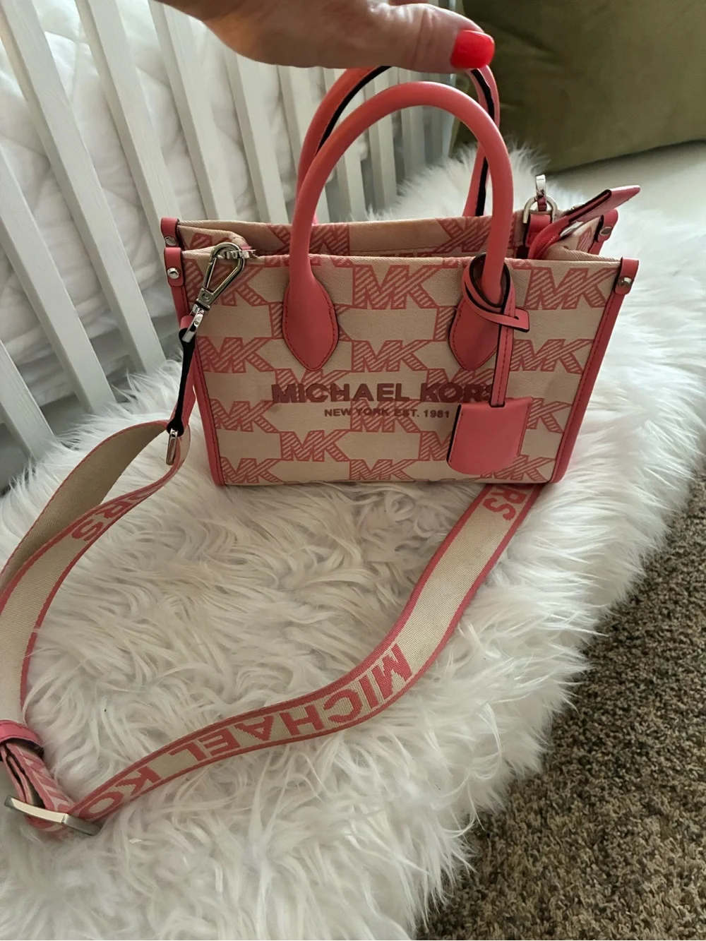 Michael Kors Mirella Small Logo Jacquard Crossbody Bag tea rose pink colorway.